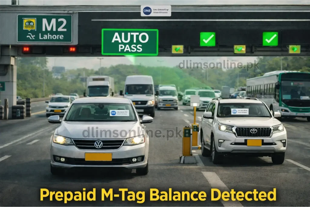 Cars and SUV using M-Tag auto pass lane on Pakistan motorway toll plaza with automatic RFID scanner detecting prepaid tag balance.