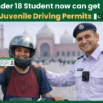 Teenage student showing juvenile driving permit with Punjab traffic police officer in Lahore Pakistan under 18 motorcycle license 2026.